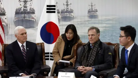 Getty Images Mike Pence (L), Fred Warmbier (C) and North Korean defector Ji Seong-ho (R)