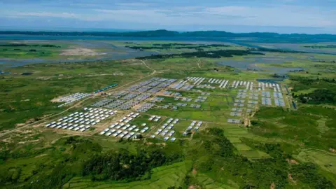 Getty Images Hla Phoe Khaung transit camp for returning Rohingya refugees is pictured from a Myanmar military helicopter