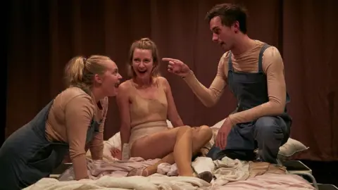 The Other Richard A scene from the play Skin A Cat