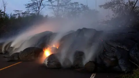 Reuters Volcanic gases rise from the Kilauea lava flow that crossed Pohoiki Road near Highway 132, near Pahoa, Hawaii, US on 28 May 2018