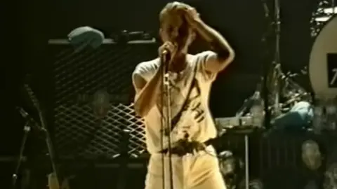 David Bowie Tin Machine/YouTube David Bowie on stage in Wolverhampton in 1991