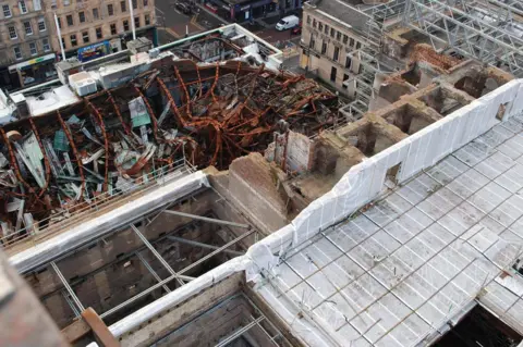 SFRS Damage to adjoining O2 ABC roof