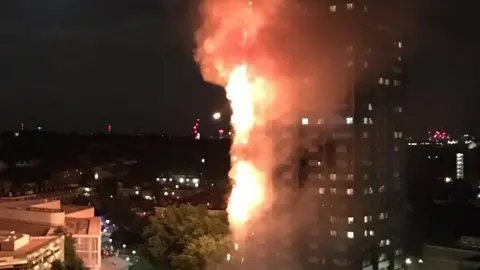 Natalie Oxford/PA The fire appeared to take hold of the building in one corner before engulfing the tower block