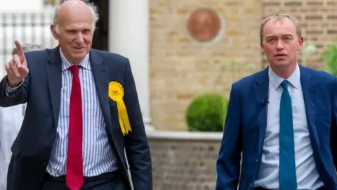 EPA Vince Cable and Tim Farron