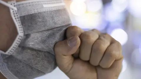 Getty Images Face mask cough