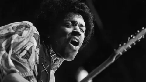 Getty Images Jimi Hendrix singing with guitar