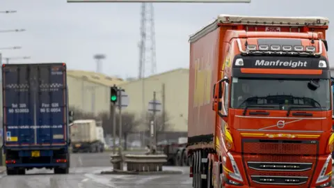 PA Media Lorries driving on a port road