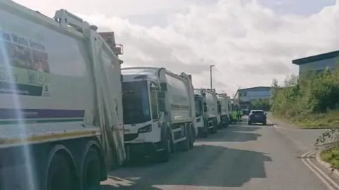 Supplied Refuse truck queue