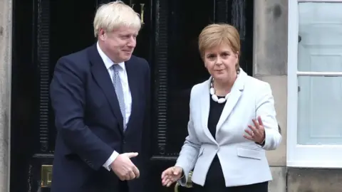 PA Media Boris Johnson and Nicola Sturgeon