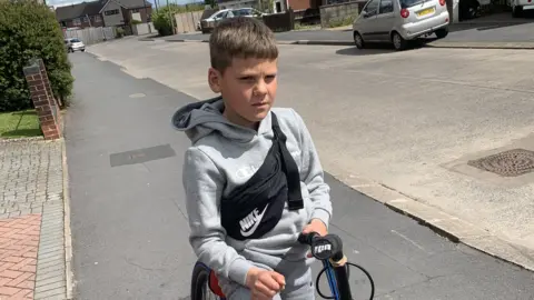 Sally Clabburn Ethan with bike