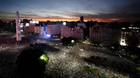 Agustin Marcarian/Reuters Argentina fans celebrate winning the World Cup at the Obelisk with an image of Lionel Messi REUTERS/Agustin Marcarian TPX IMAGES OF THE DAY