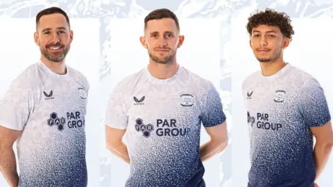 Preston North End Players wearing the new limited-edition 'splash' design shirt to honour Sir Tom Finney