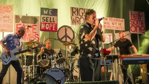 Getty Images Terry Hall of The Specials performs during Cornbury Festival 2019