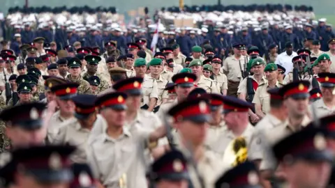 PA Media Members of the armed forces during a full tri-service and Commonwealth rehearsal