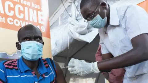 Getty Images A man being vaccinated in South Sudan