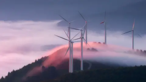 Getty Images Wind turbines