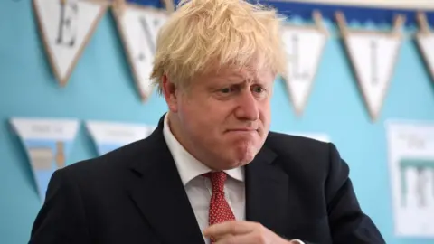 Reuters Boris Johnson school viist