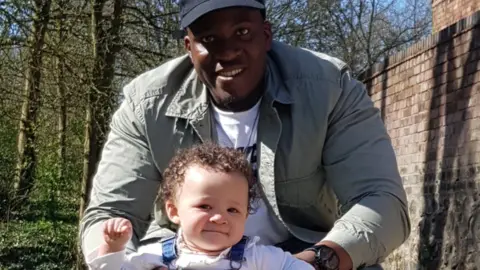 West Midlands Police Nathan Burton with his daughter