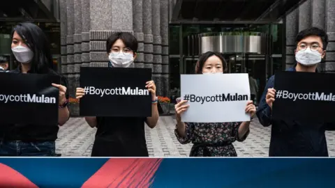 Getty Images People calling for a boycott of Mulan