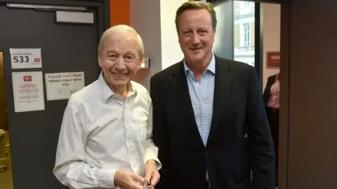 Reuters John Humphrys and David Cameron