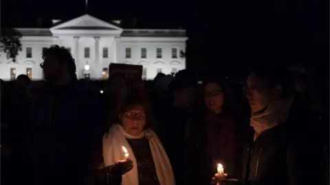 Getty Images A vigil at the White House took place on Saturday night after the Pittsburgh shooting