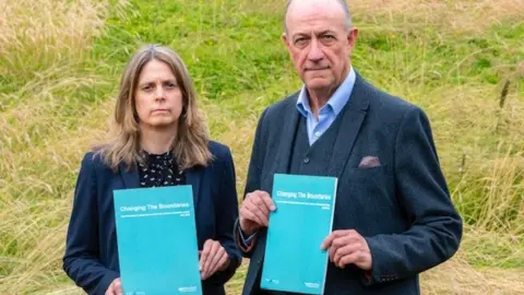 sportscotland Louise Tideswell and Stewart Harris with copies of the Changing the Boundaries report