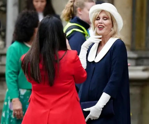 PA Media Dame Joanna Lumley posing for a photograph