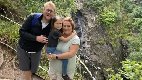 Family handout John, Ros and Maggie