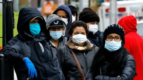 EPA New Yorkers wearing masks, 2 Apr 20