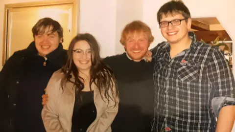 Family photo Nell with her brothers