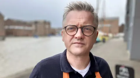 On Toast cafe owner David Purchase on the dockside in Gloucester