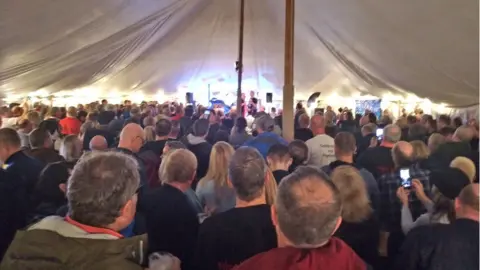 Nigel Smith A marquee at the event filled with hundreds of people