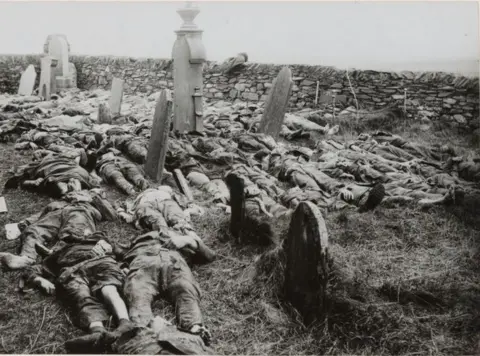 US National Archives Victims of the Otranto disaster. American soldiers laid out for burial in the churchyard at Kilchoman, Islay, Scotland. The church was used as a temporary morgue