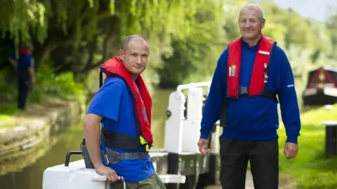 Canal and River Trust male lock keepers on the Monmouthshire and Brecon canal