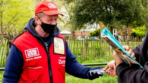 Louise Haywood-Schiefer Dave taking a payment