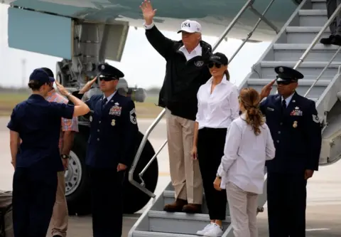 Reuters President Donald Trump waves next to First Lady Melania Trump upon arrival in Corpus Christi, Texas, 29 August 2017