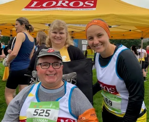 BBC Graham Taylor with wife Lindsey and fellow runner and nurse Amy Brown