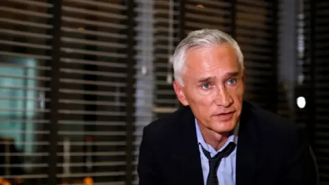 Reuters Jorge Ramos, anchor of Spanish-language U.S. television network Univision, talks to the media, after he and his team were released