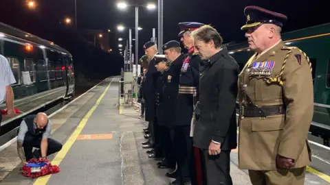 Will Elliott Poppy wreath being laid