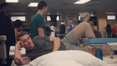 Sean Dougherty Sean Dougherty posing in the gym