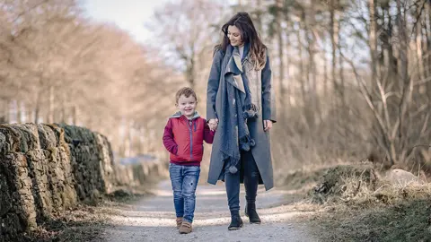 Craig Russell Kelly walking with her son Finnlay