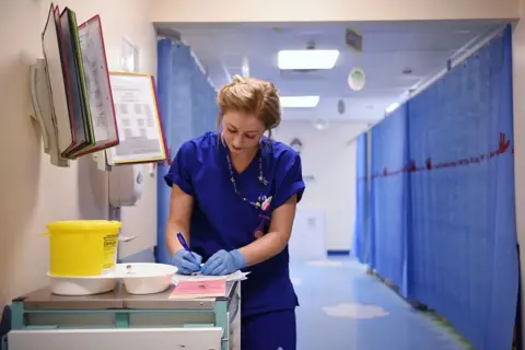 Getty Images Picture of a young doctor in a hospital