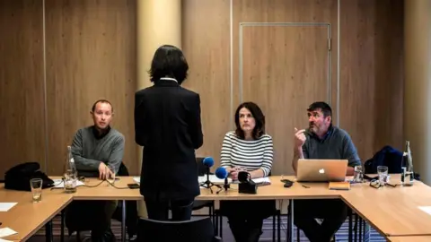 AFP Grace Meng talks to journalists on October 7, 2018 in Lyon during a press conference during which she did not want her face to be shown