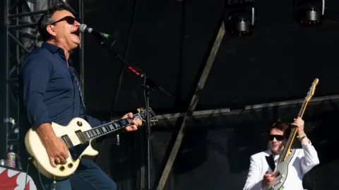 Getty Images The band playing on stage at Glastonbury 24 June 2023