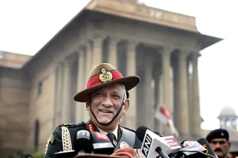 Hindustan Times/Getty Images Outgoing Chief of Army Staff (CoAS) General Bipin Rawat after inspecting the Guard of Honour, at South Block lawns, on December 31, 2019 in New Delhi, India.