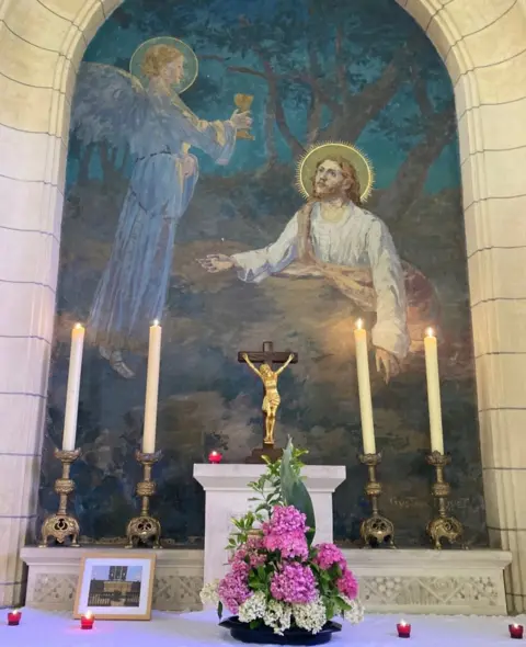 Crucifix back in place at the church