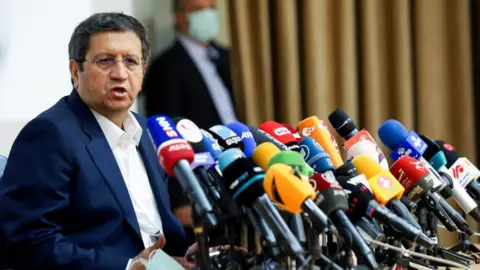 Reuters Iranian presidential candidate Abdolnaser Hemmati speaks during a press conference in Tehran, Iran (15 June 2021)