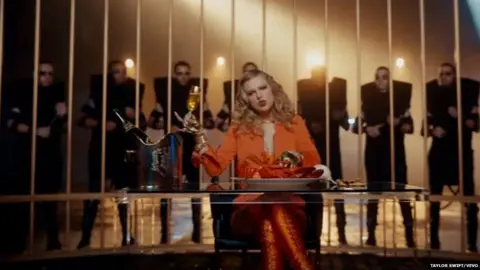 Taylor Swift/Vevo Taylor Swift in a cage