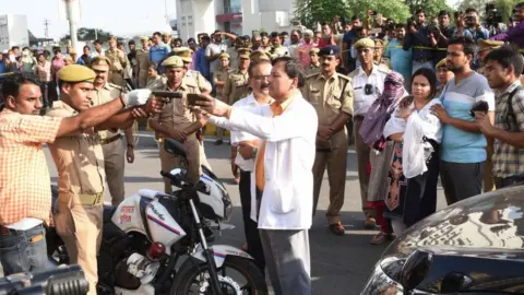 Getty Images The Special Investigation Team (SIT) recreates crime scene in presence of Vivek Tiwari's ex-colleague for further investigation,