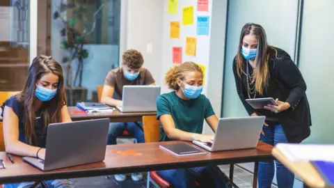 Getty Images Pupils working at school during the pandemic